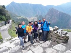 Arrival of the group of hikers at Machu Picchu